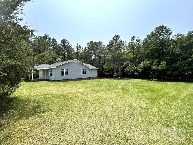 a view of outdoor space with lots of trees