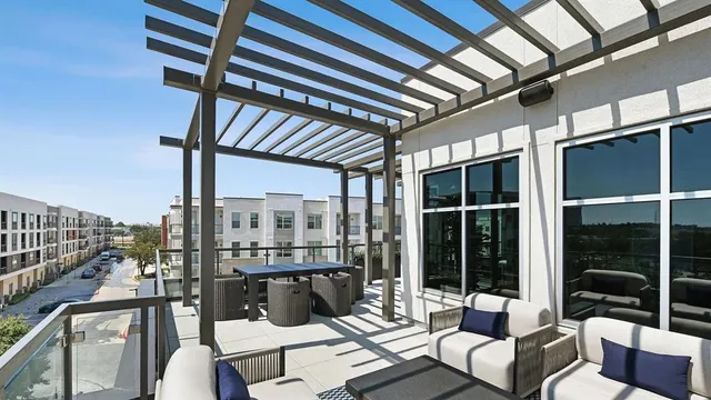 a view of a patio with couches chairs dining table and chairs