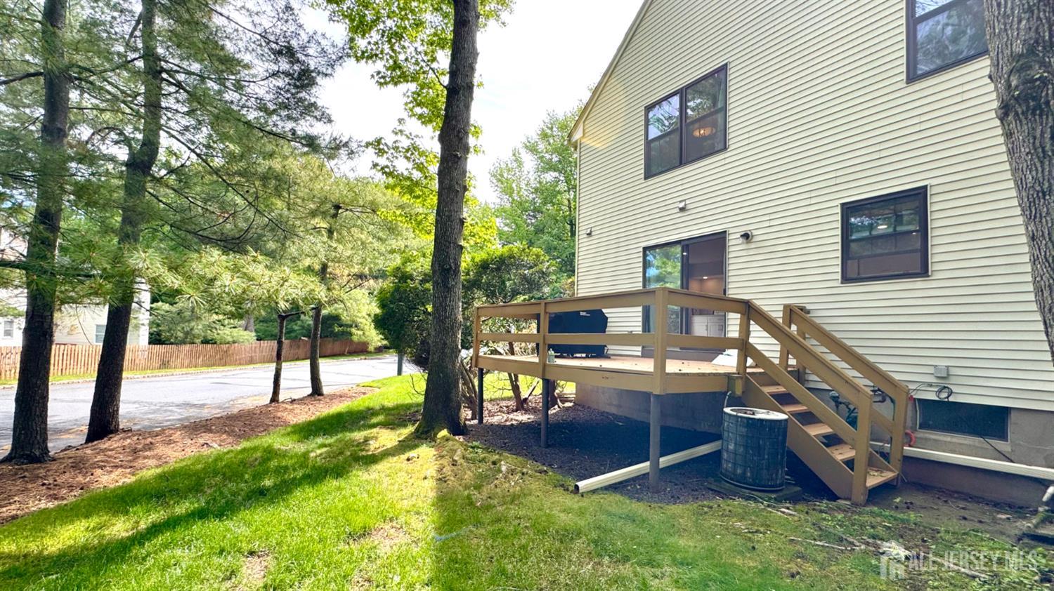 507 Timber Oaks Road Edison, NJ 08820 - Photo 17 of 17 a view of a house with backyard and a tree