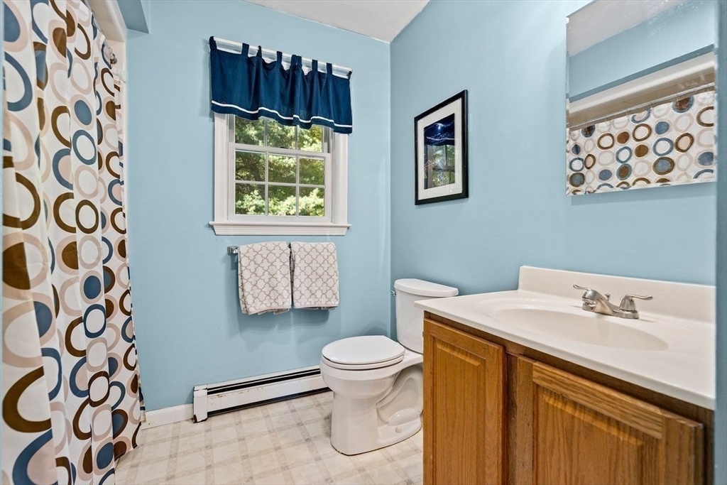 29 Charlotte Road Ipswich, MA 01938 - Photo 22 of 42 a bathroom with a sink and a mirror