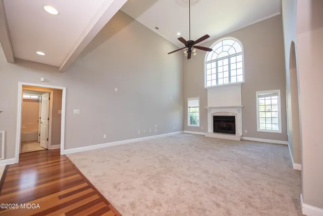 a kitchen with stainless steel appliances granite countertop a sink and wooden cabinets