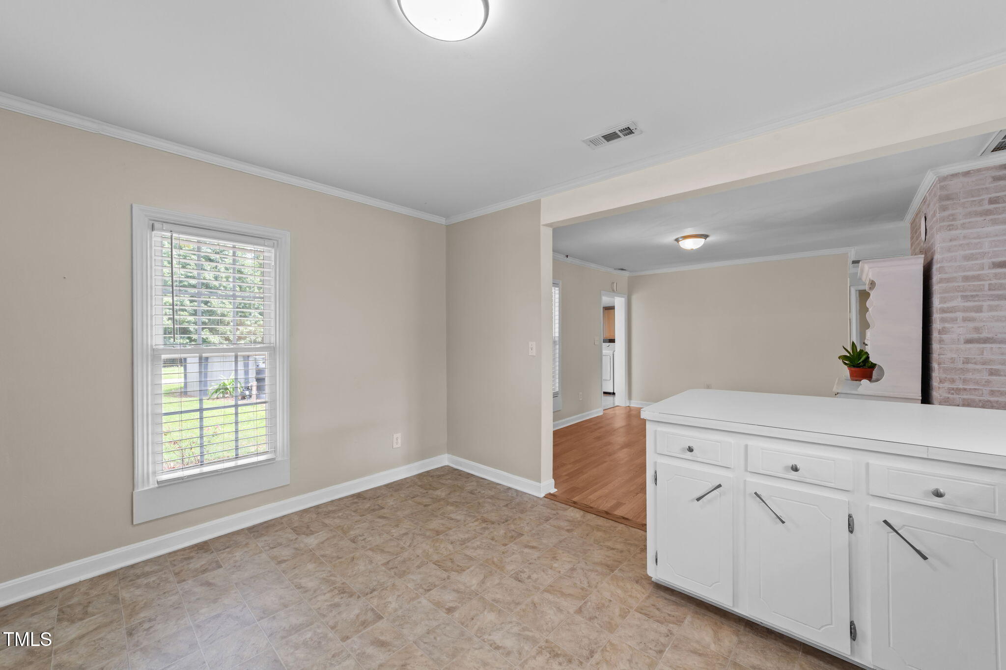 1425 Langdon Road Angier, NC 27501 - Photo 18 of 55 a view of cabinets a bed and a window in a room