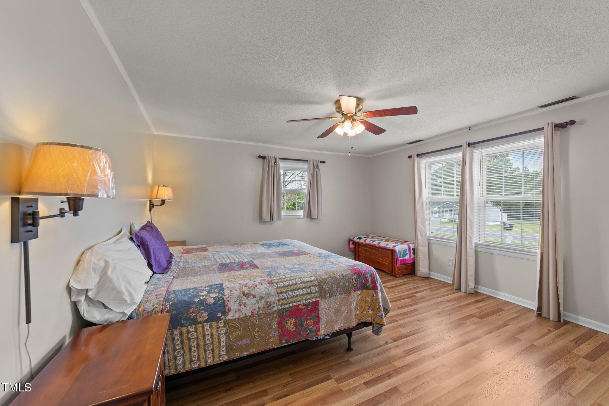 1425 Langdon Road Angier, NC 27501 - Photo 21 of 55 a bedroom with a bed dresser and a window