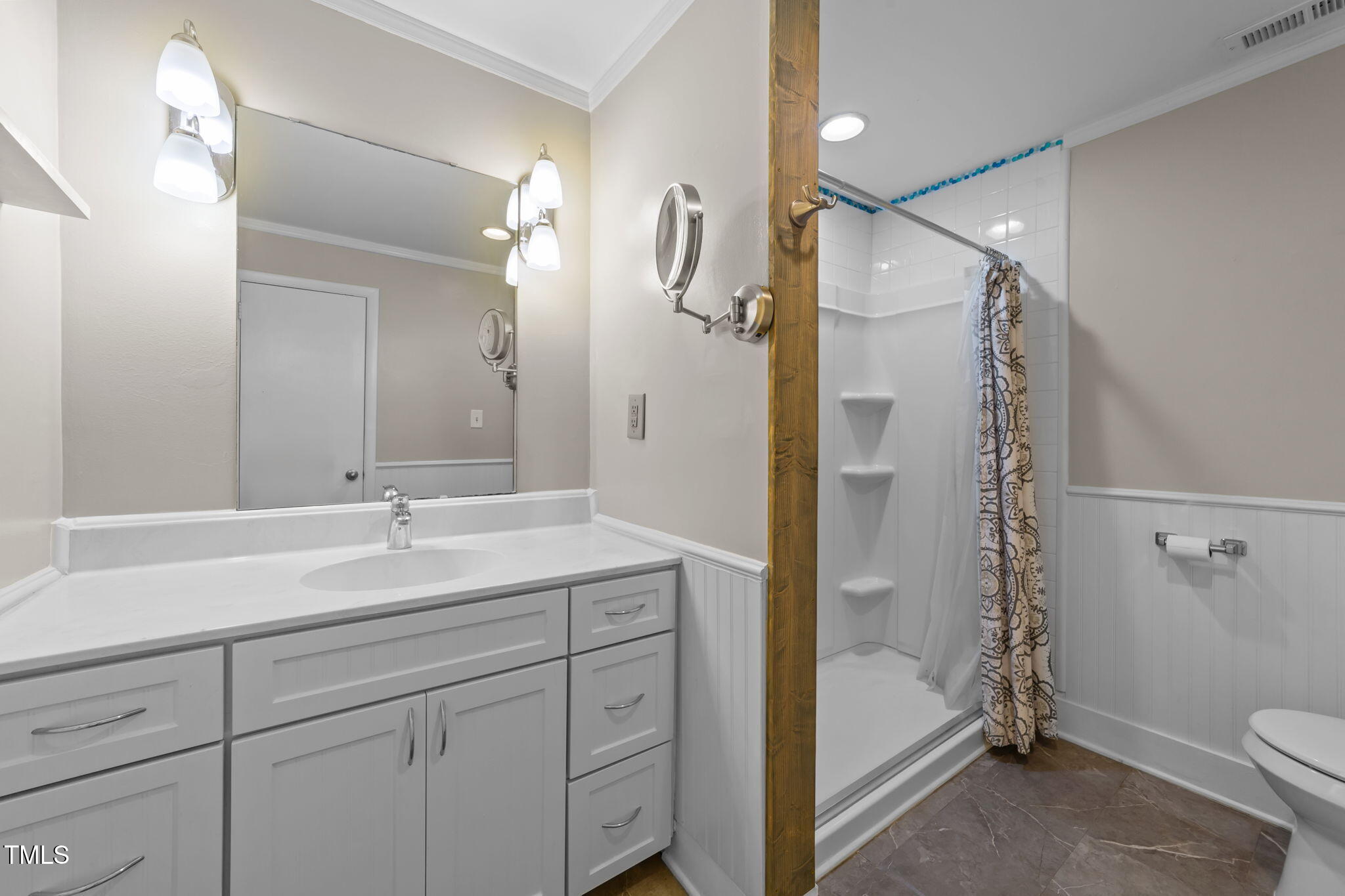 1425 Langdon Road Angier, NC 27501 - Photo 23 of 55 a bathroom with a sink a toilet and shower