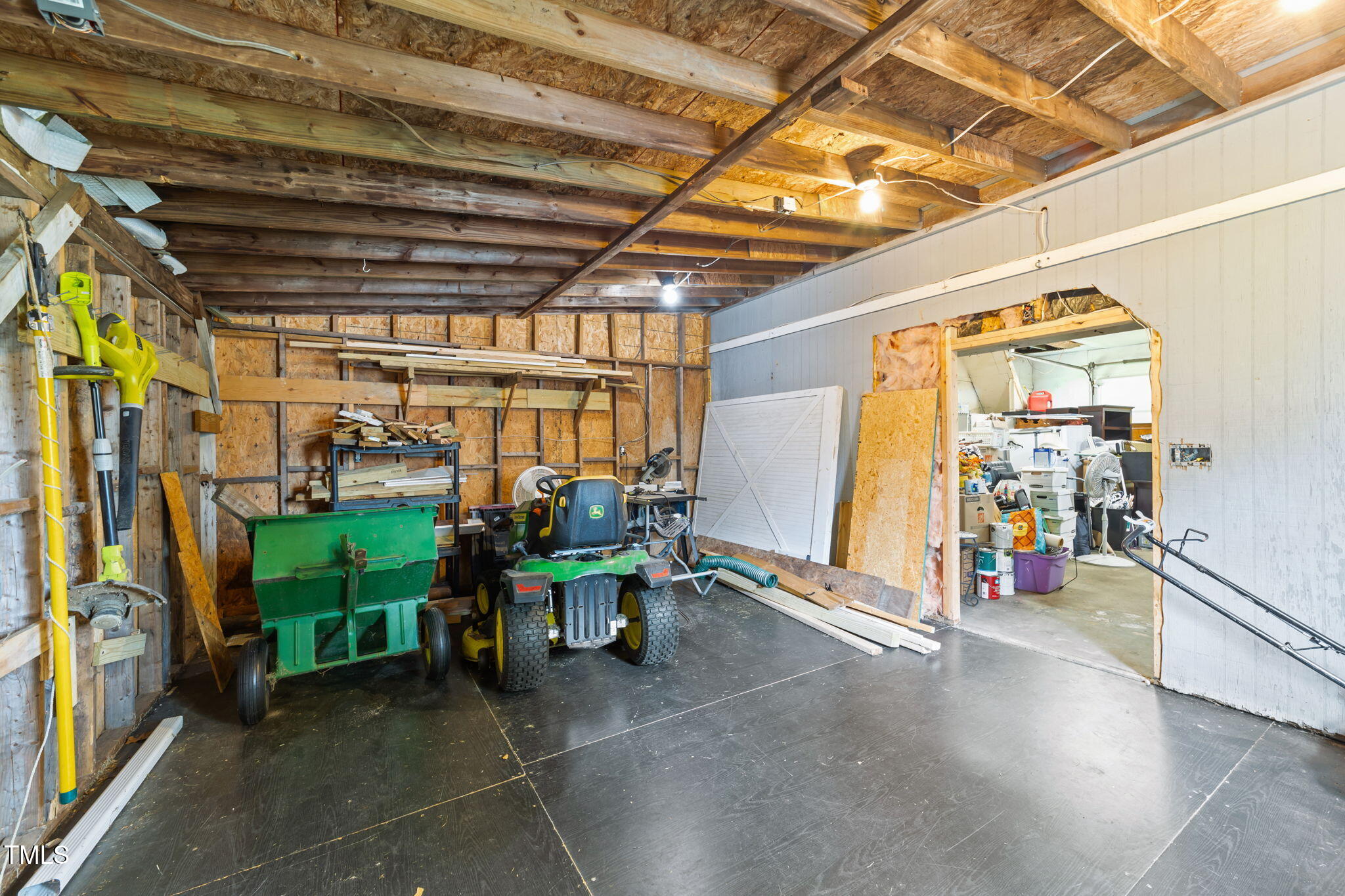 1425 Langdon Road Angier, NC 27501 - Photo 40 of 55 a view of a room with racks on the wall