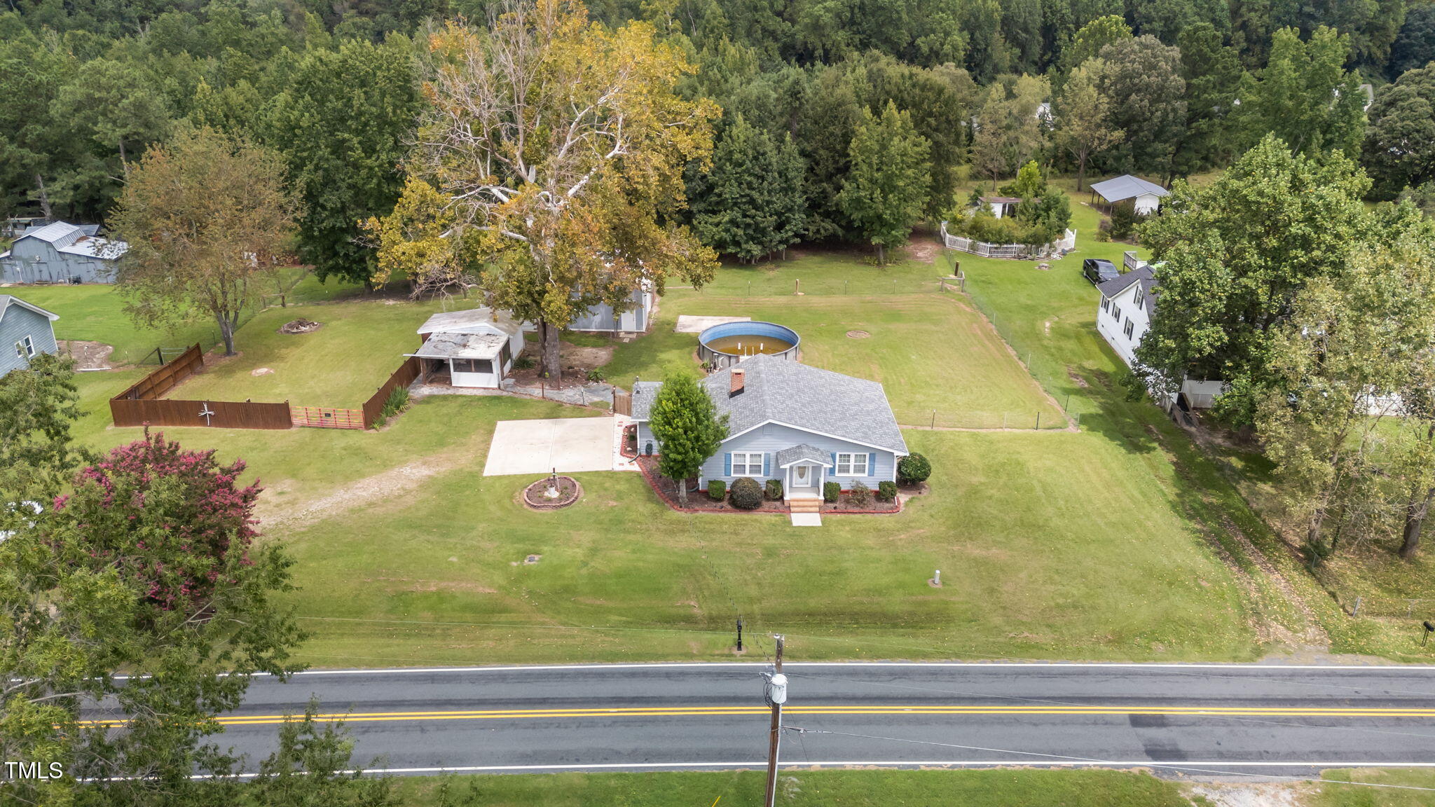 1425 Langdon Road Angier, NC 27501 - Photo 45 of 55 a view of a yard with an outdoor space