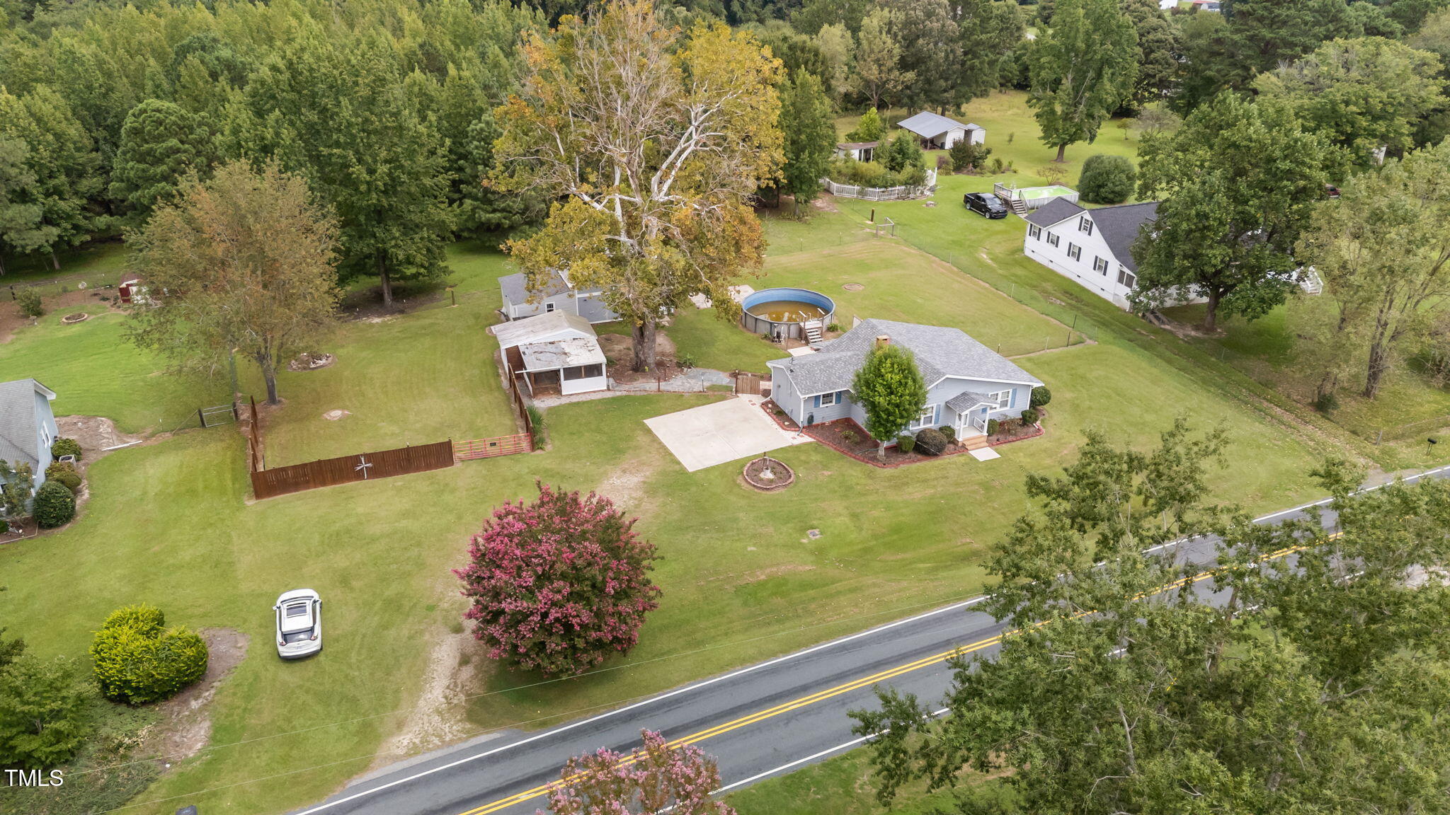 1425 Langdon Road Angier, NC 27501 - Photo 46 of 55 an aerial view of a residential houses with outdoor space
