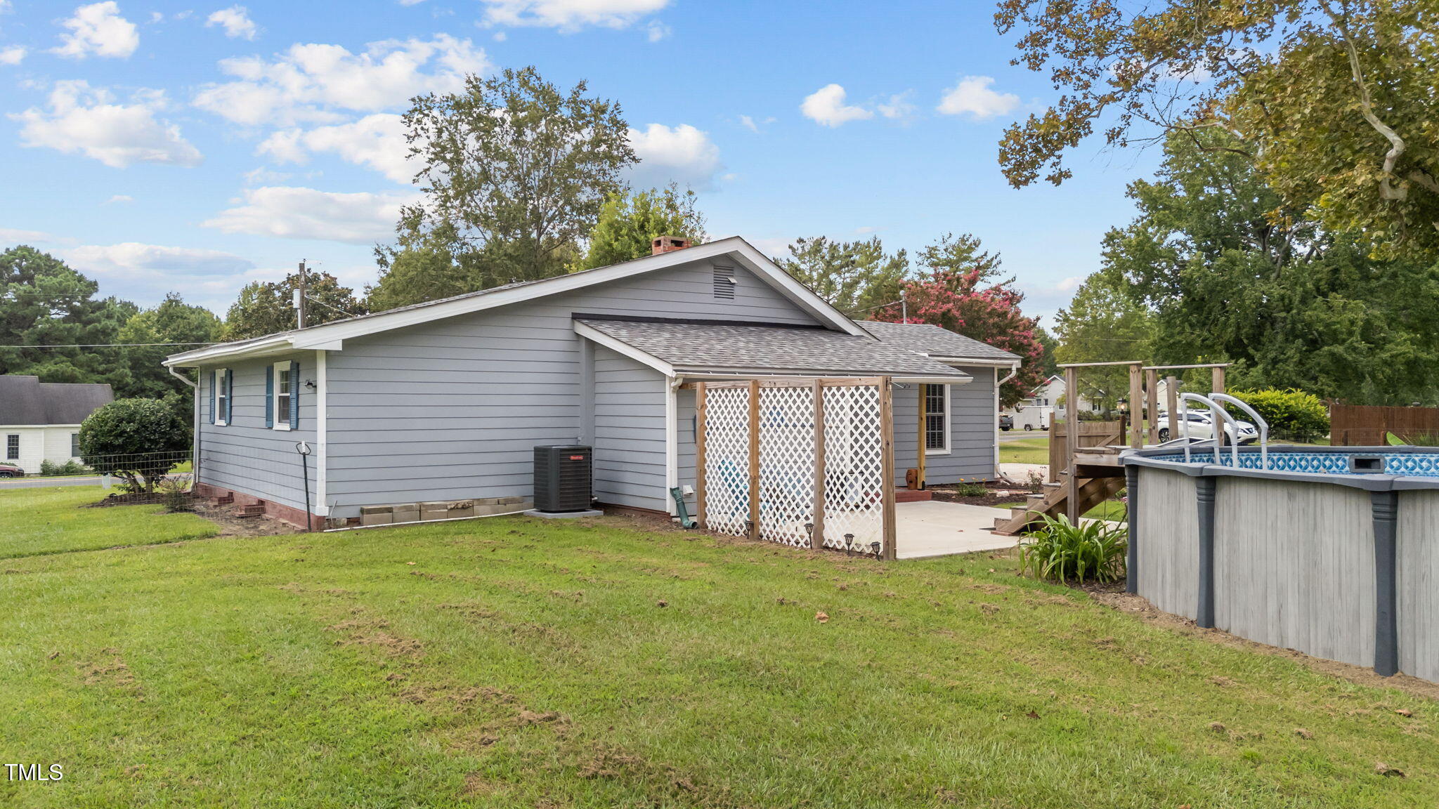 1425 Langdon Road Angier, NC 27501 - Photo 50 of 55 a view of a house with a yard and sitting area