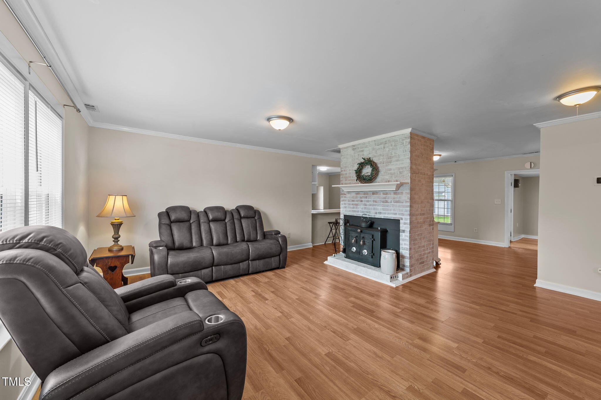 1425 Langdon Road Angier, NC 27501 - Photo 5 of 55 a living room with furniture and a fireplace