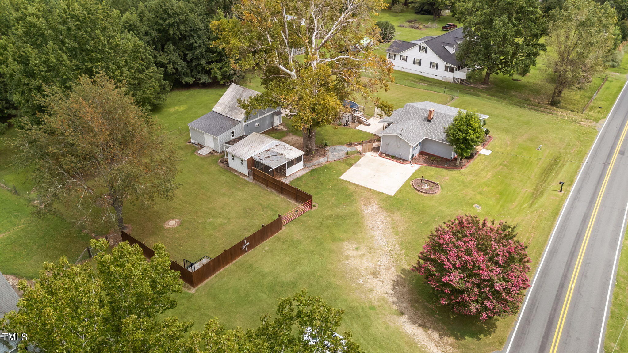 1425 Langdon Road Angier, NC 27501 - Photo 53 of 55 an aerial view of a house with a yard swimming pool and outdoor seating