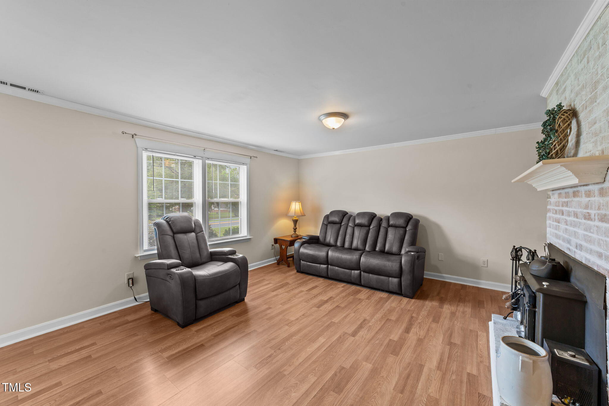 1425 Langdon Road Angier, NC 27501 - Photo 8 of 55 a living room with furniture and a flat screen tv