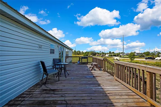 a view of a terrace with sitting area