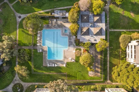 aerial view of a houses with street