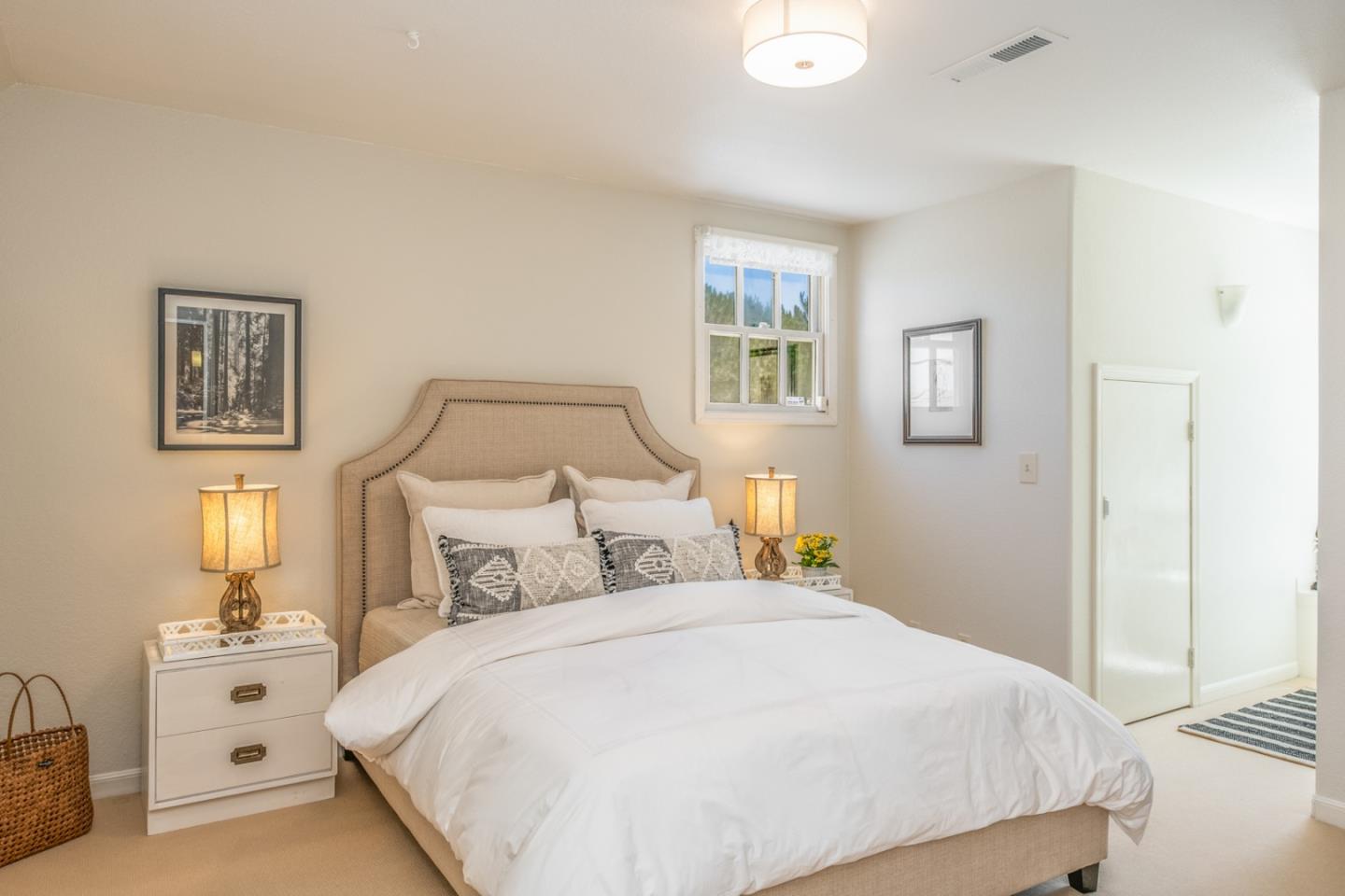 3602 Eastfield Road Carmel, CA 93923 - Photo 15 of 27 a bedroom with a bed and a night stand