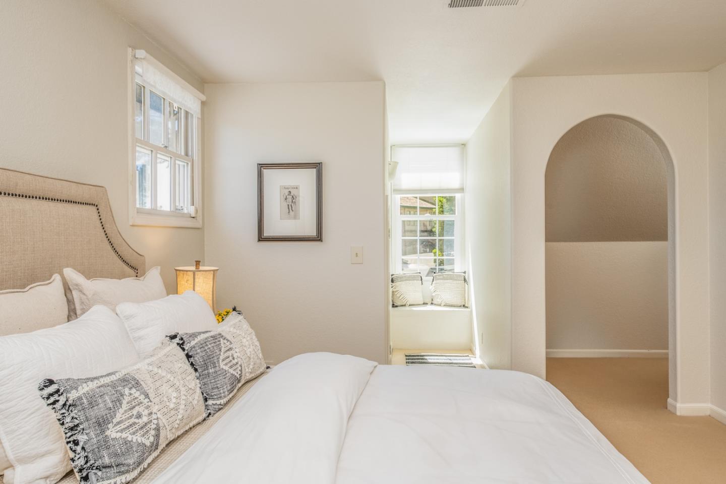 3602 Eastfield Road Carmel, CA 93923 - Photo 16 of 27 a bedroom with a bed and a painting on the wall