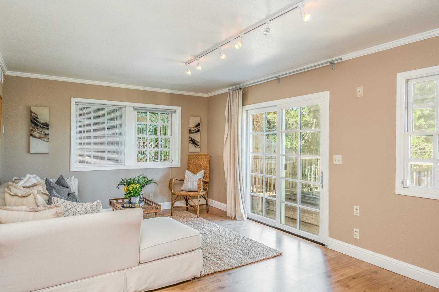 3602 Eastfield Road Carmel, CA 93923 - Photo 20 of 27 a living room with furniture and floor to ceiling windows