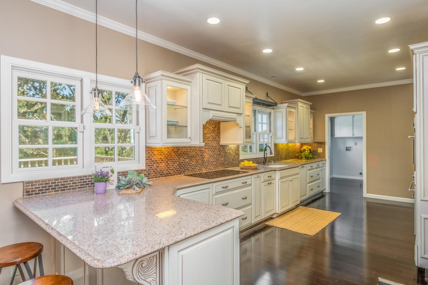 3602 Eastfield Road Carmel, CA 93923 - Photo 3 of 27 a kitchen with stainless steel appliances granite countertop a sink a stove and a refrigerator