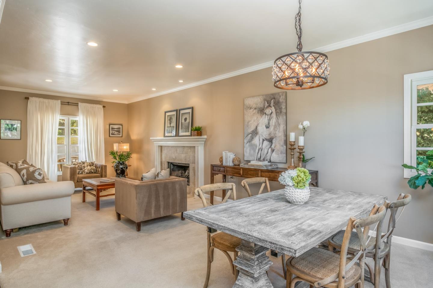 3602 Eastfield Road Carmel, CA 93923 - Photo 6 of 27 a view of a dining room with furniture wooden floor and chandelier