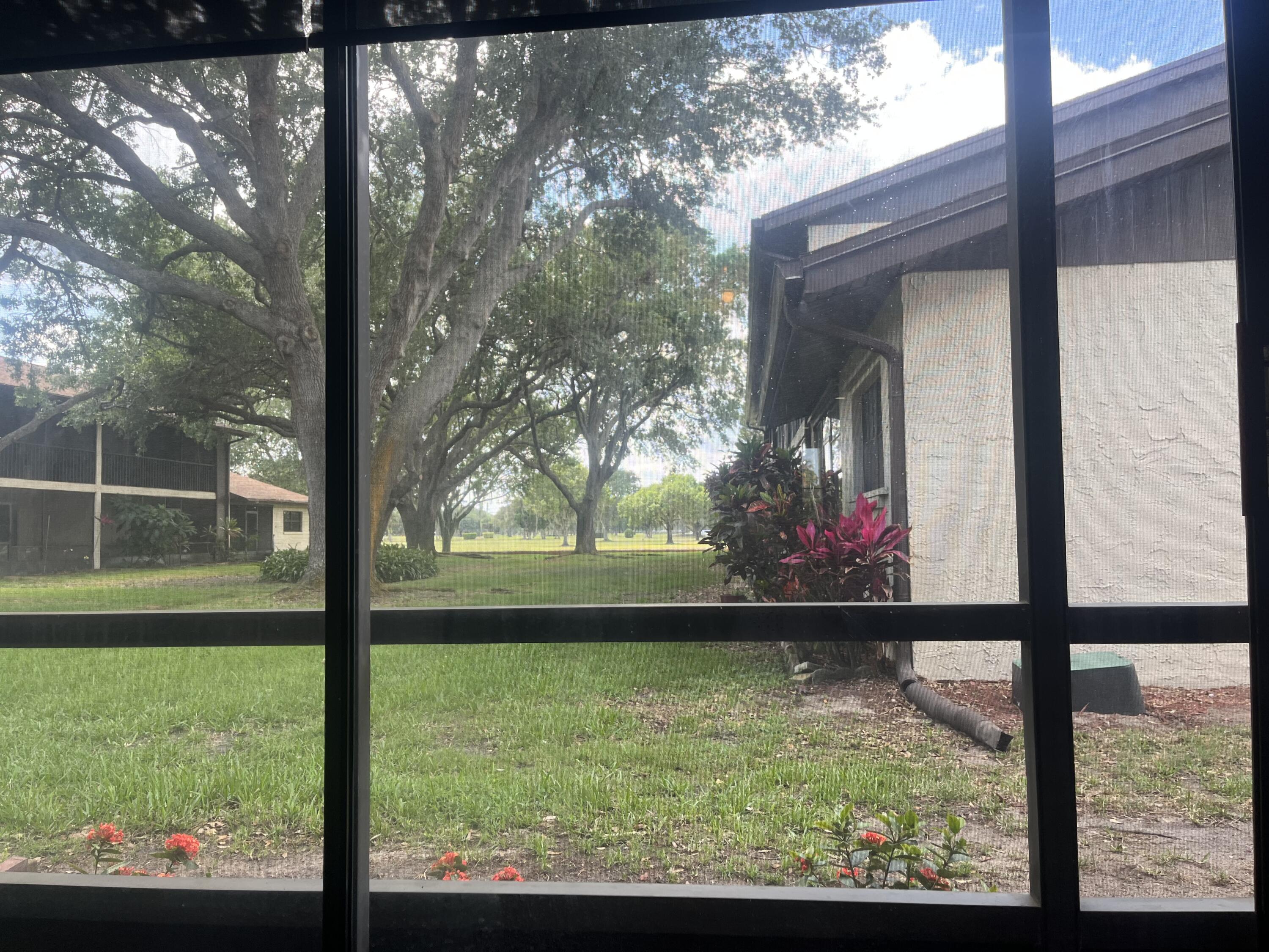 1675 South Fiske Boulevard, Unit 155 Rockledge, FL 32955 - Photo 23 of 24 a view of backyard from window