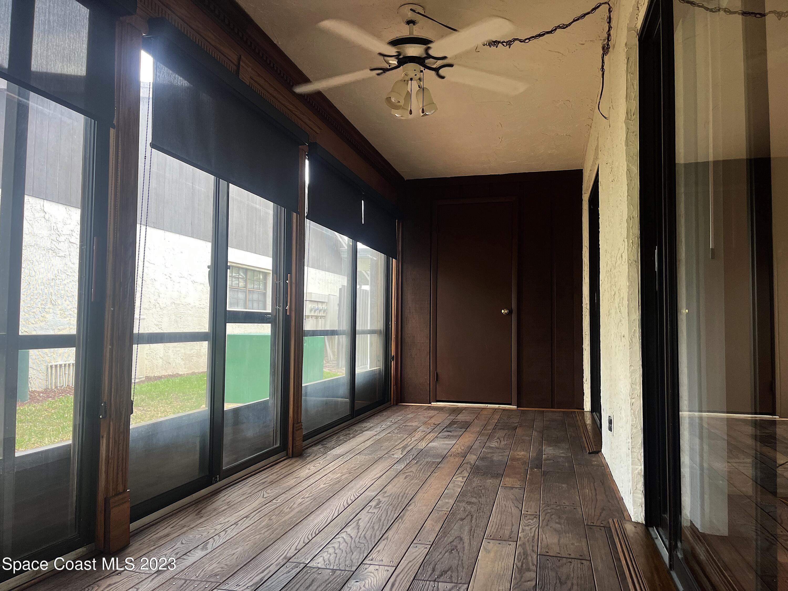 1675 South Fiske Boulevard, Unit 155 Rockledge, FL 32955 - Photo 9 of 24 a view of gallery with wooden floor