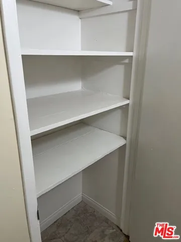 an empty room with a hallway