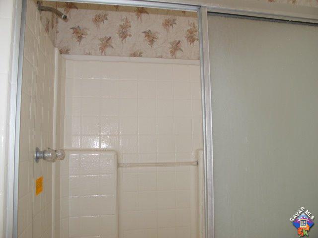 10911 Soledad Road Pinon Hills, CA 92372 - Photo 25 of 25 a bathroom with a shower