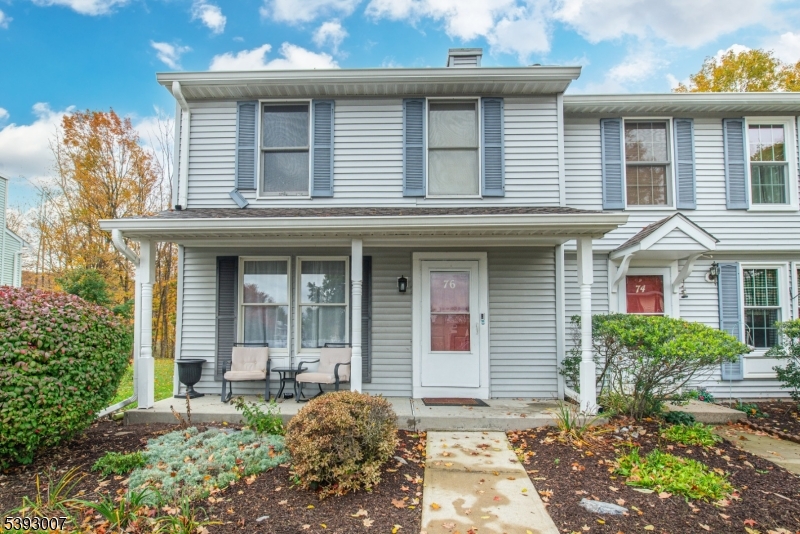 76 Constitution Way, Unit 76 Franklin, NJ 07416 - Photo 2 of 22 a front view of a house with garden