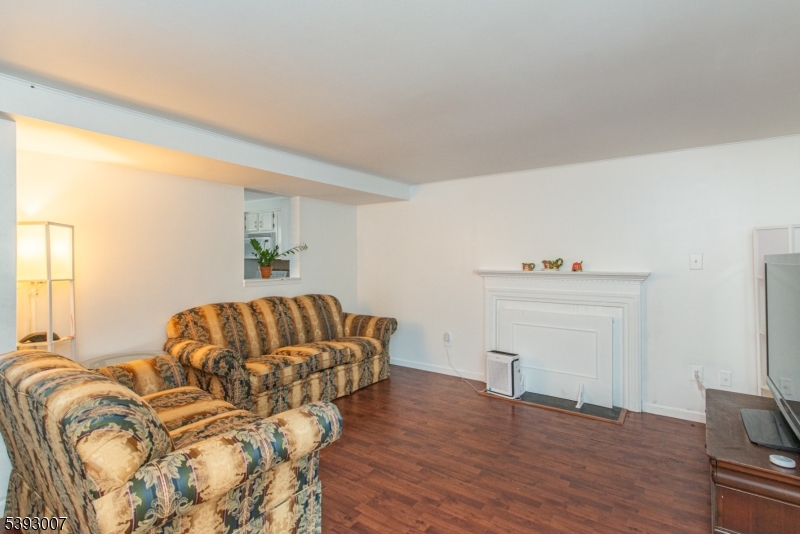 76 Constitution Way, Unit 76 Franklin, NJ 07416 - Photo 9 of 22 a living room with furniture