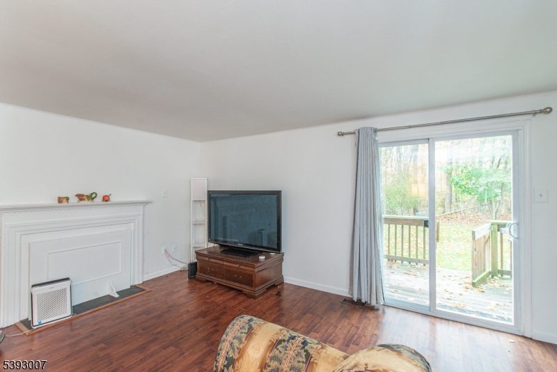 76 Constitution Way, Unit 76 Franklin, NJ 07416 - Photo 10 of 22 a living room with furniture and a window