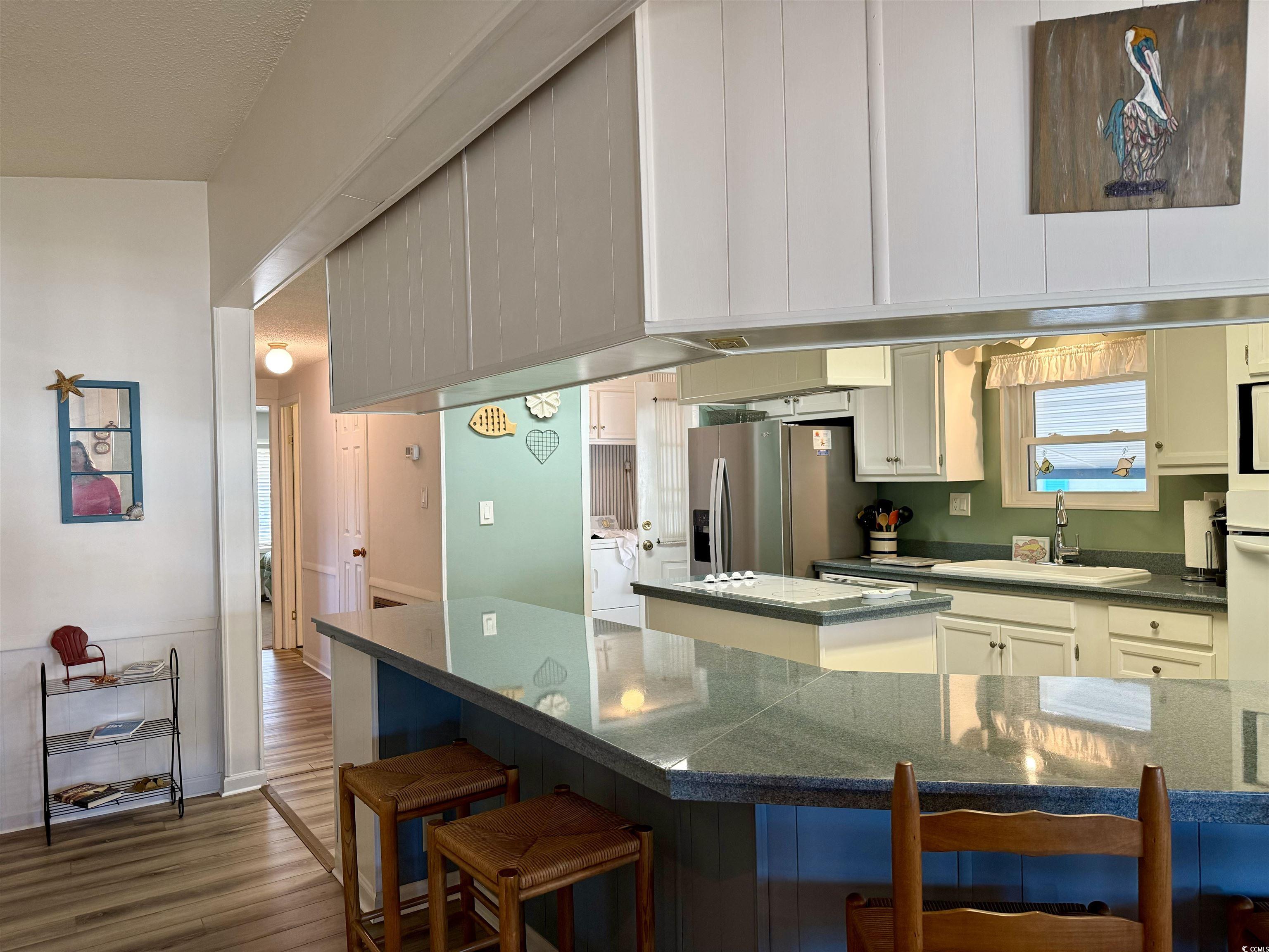 502 Sandpebble Surfside Beach, SC 29575 - Photo 11 of 31 Kitchen with sink, washing machine and clothes dry