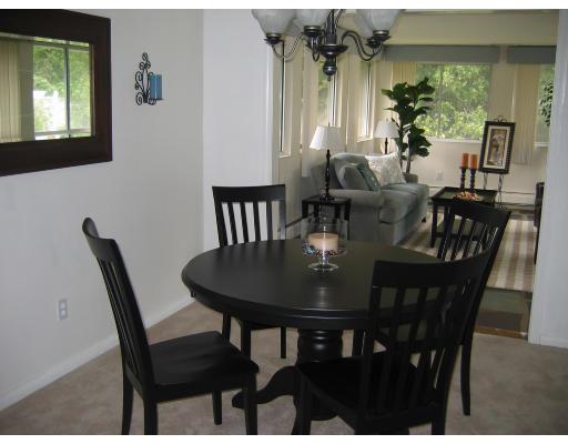 28 Wentworth Road Canton, MA 02021 - Photo 4 of 10 a view of a dining room with furniture and a potted plant