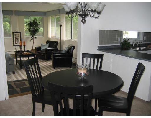 28 Wentworth Road Canton, MA 02021 - Photo 5 of 10 a view of a dining room with furniture and a potted plant