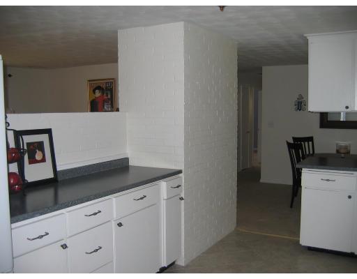 28 Wentworth Road Canton, MA 02021 - Photo 8 of 10 a kitchen with a sink and cabinets
