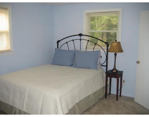 28 Wentworth Road Canton, MA 02021 - Photo 9 of 10 a bedroom with a bed window and flowerpot