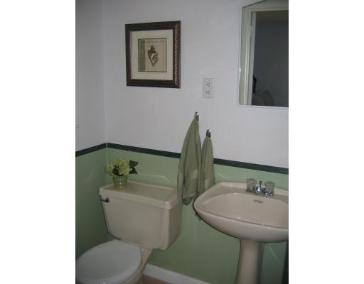 28 Wentworth Road Canton, MA 02021 - Photo 10 of 10 a bathroom with a sink mirror and toilet