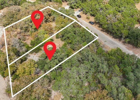 9 East Valley Spring Road Wimberley, TX 78676 - Photo 4 of 11 a view of a tennis court