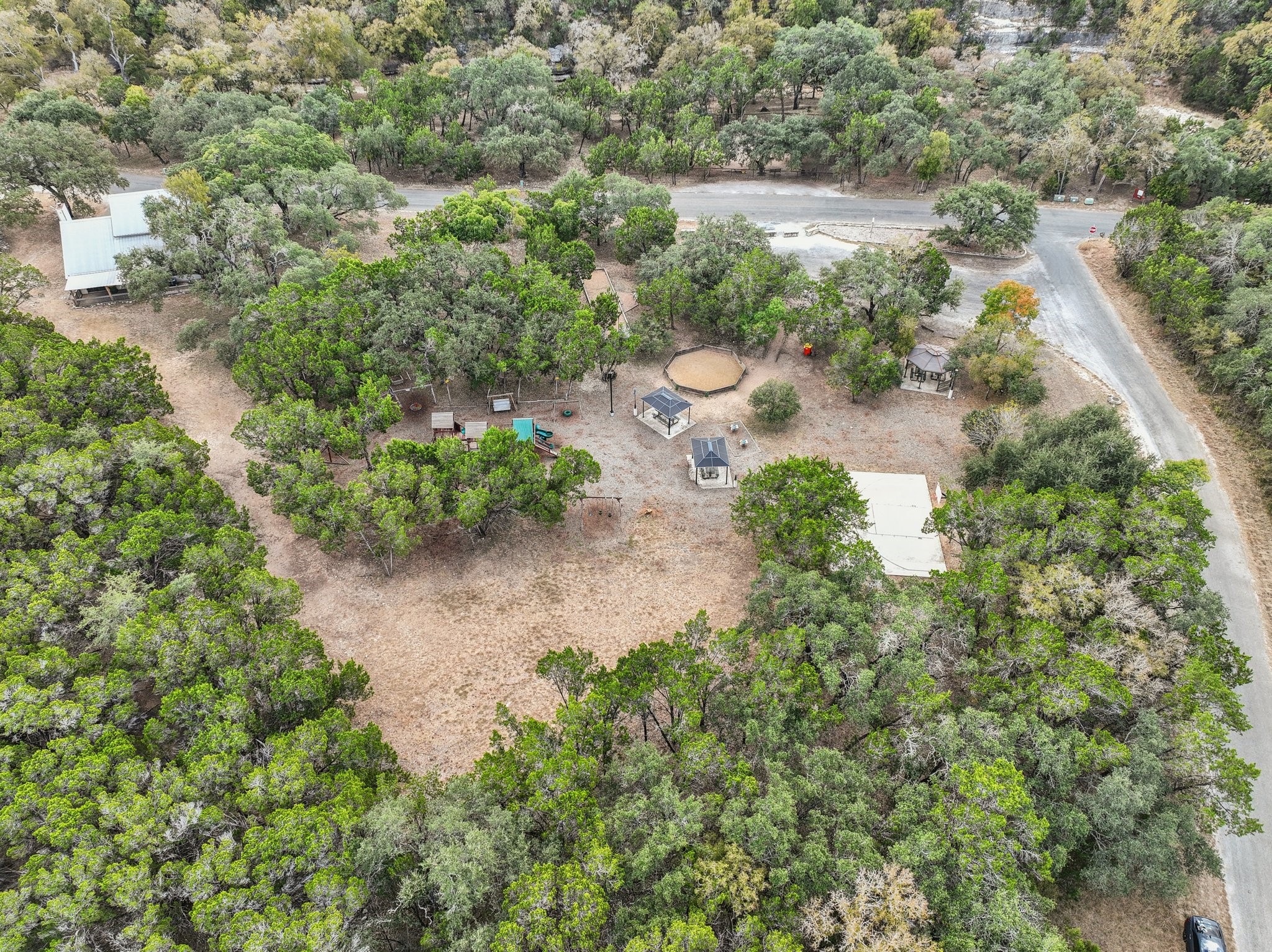 9 East Valley Spring Road Wimberley, TX 78676 - Photo 10 of 11 a view of a lake with a lot of trees