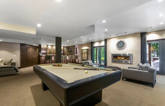 a view of living room with granite countertop furniture and fireplace