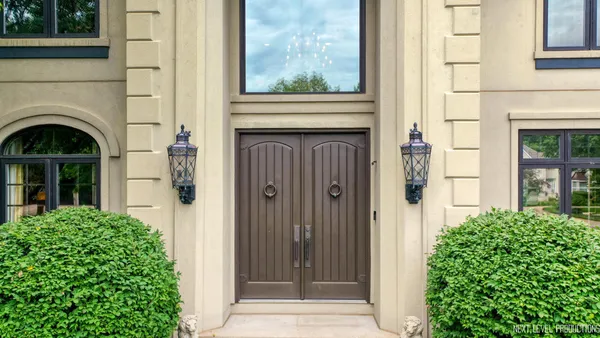 a view of entrance door of house