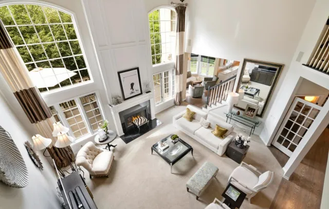 a view of living room with furniture and a window