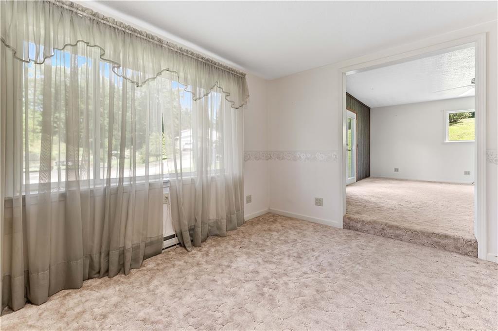 200 Brown Hill Road Markleysburg, PA 15459 - Photo 20 of 35 a bedroom with a bed and a window