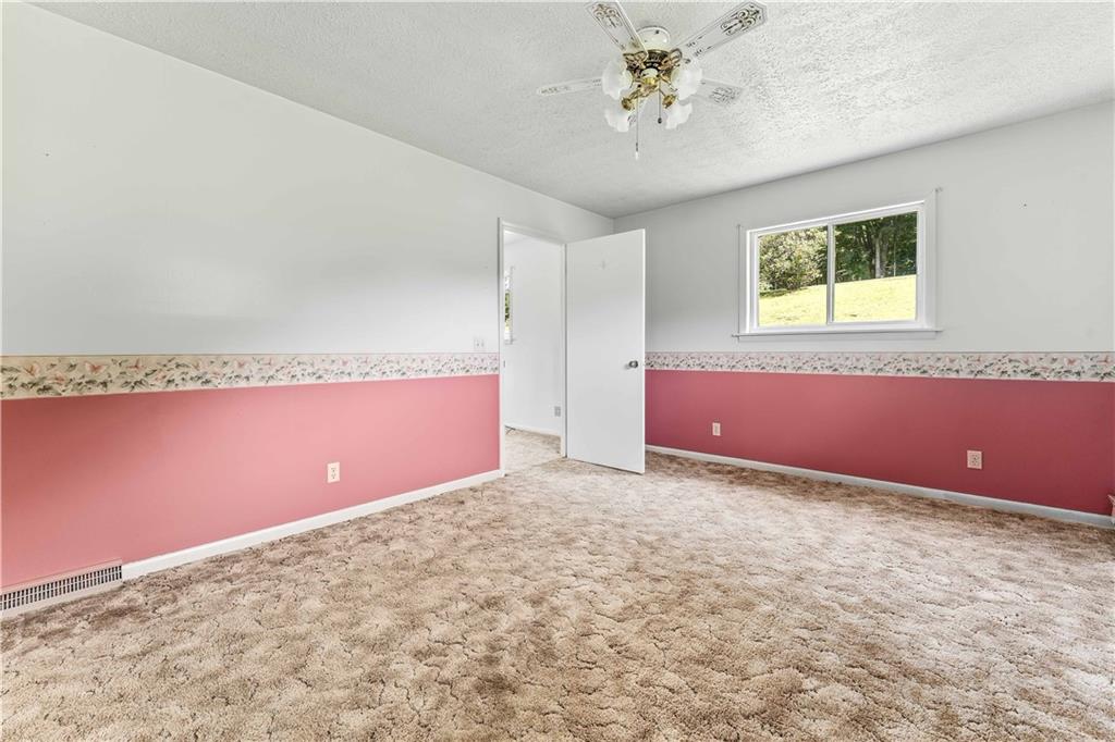 200 Brown Hill Road Markleysburg, PA 15459 - Photo 27 of 35 a view of empty room with window