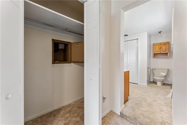 a view of a big room with carpet