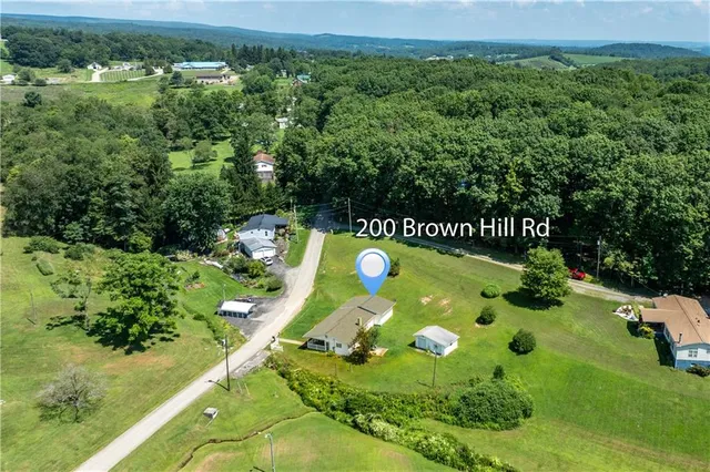 an aerial view of a golf course with garden