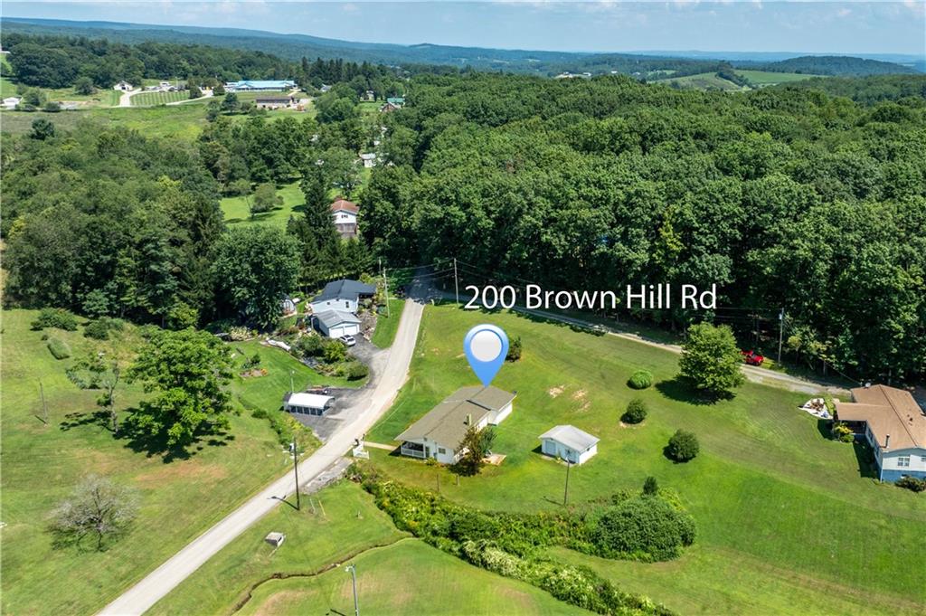 200 Brown Hill Road Markleysburg, PA 15459 - Photo 5 of 35 an aerial view of a golf course with garden