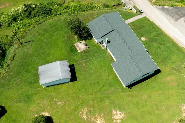 swimming pool with a yard