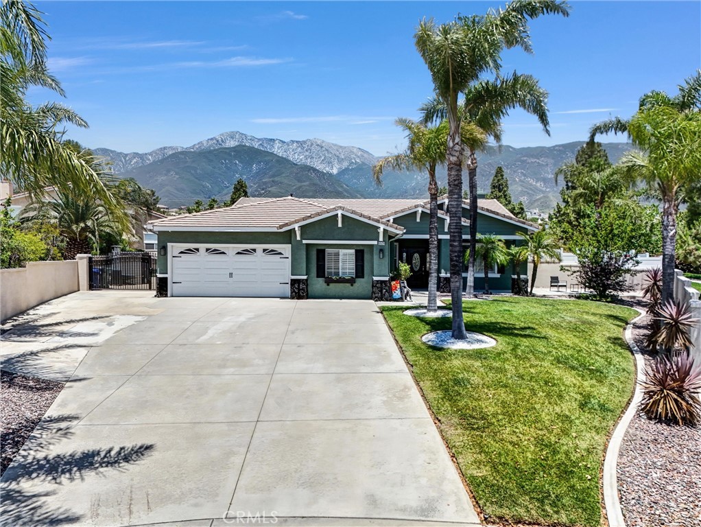 5520 Meadowbrook Court Rancho Cucamonga, CA 91739 - Photo 1 of 1 a front view of house with yard and green space