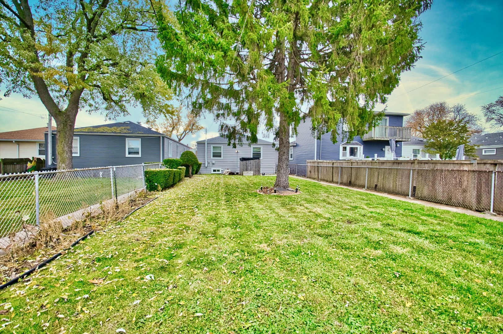 4122 Clinton Avenue Stickney, IL 60402 - Photo 38 of 44 a front view of a house with a yard
