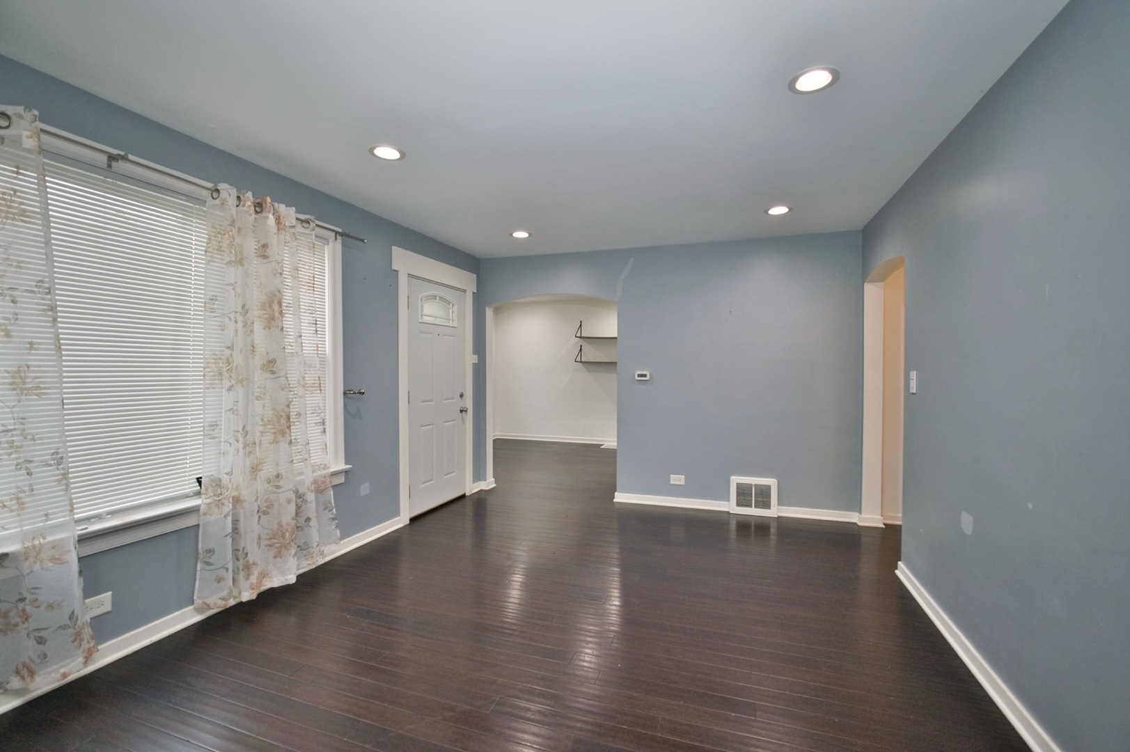 4122 Clinton Avenue Stickney, IL 60402 - Photo 5 of 44 a view of a livingroom with wooden floor