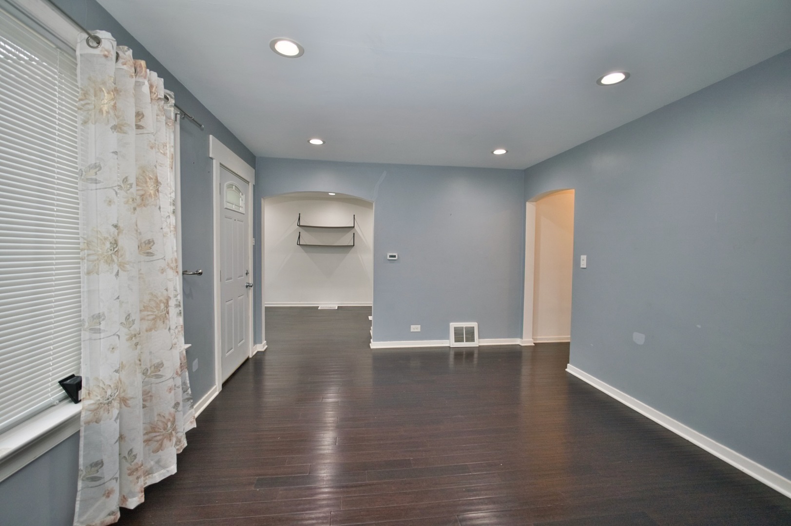 4122 Clinton Avenue Stickney, IL 60402 - Photo 6 of 44 a view of a hallway with wooden floor